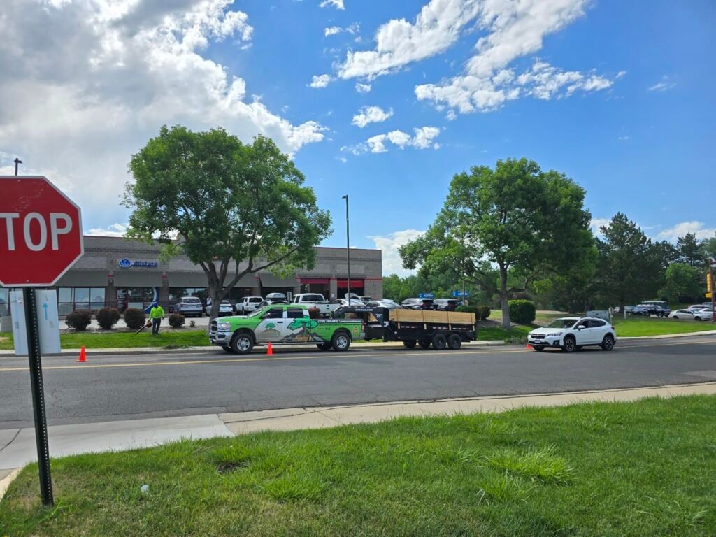 Creative Tree & Stump truck and trailer at a commercial job